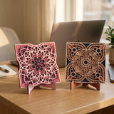 Sakura and Jaipur desk mandalas on stands beside a laptop