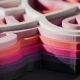 Macro of the six printed layers — no paint